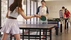 A table tennis table in a room with a whiteboard in the background. - Deakin Residential Services (Burwood)