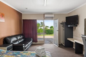 Standard Motel Room - Double | Living area | Flat-screen TV