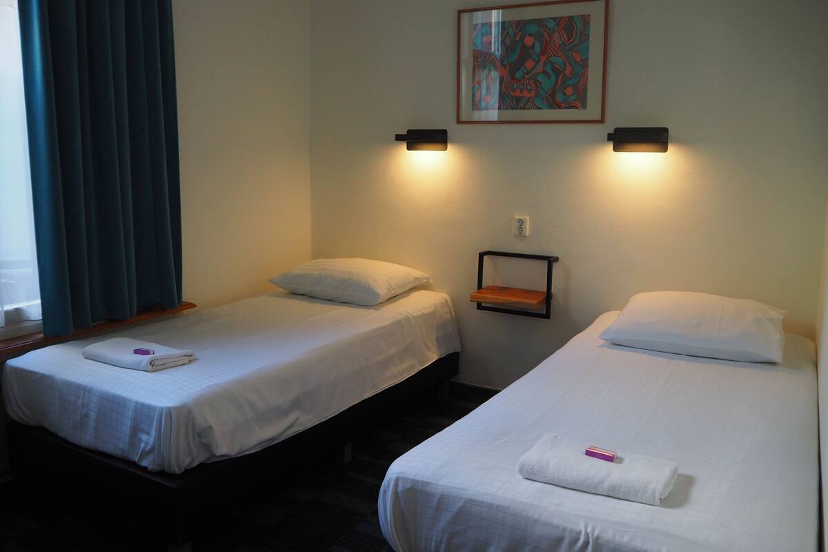 Twin kamer, privébadkamer | Gratis wifi, beddengoed