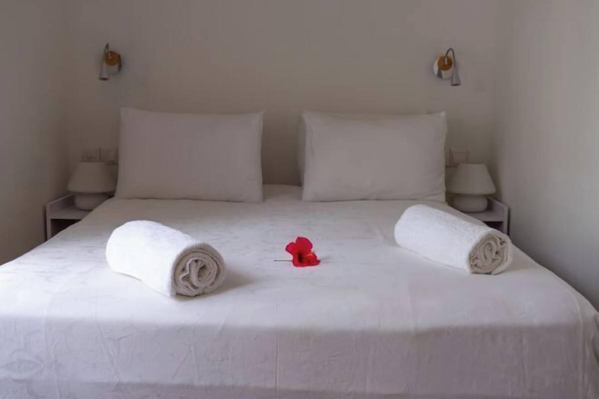 Down comforters, pillowtop beds, in-room safe, desk