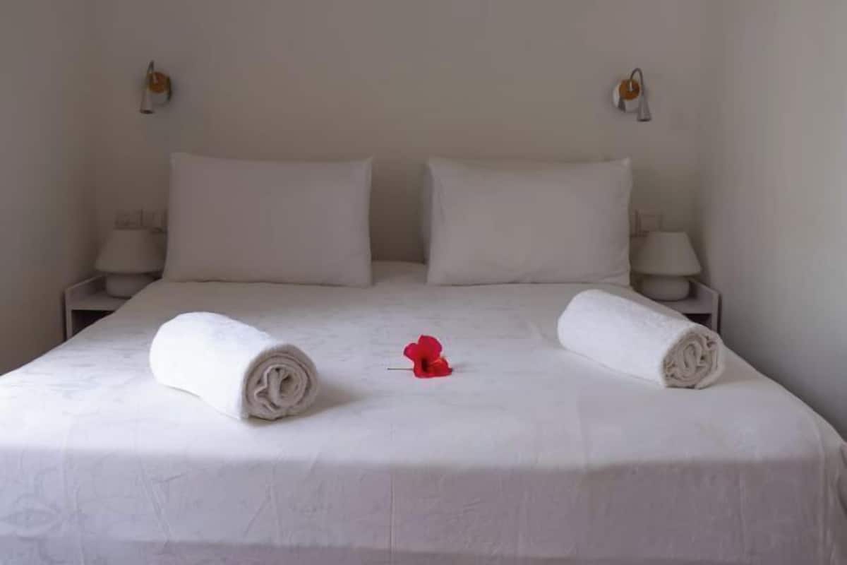 Down duvets, pillow-top beds, in-room safe, individually decorated