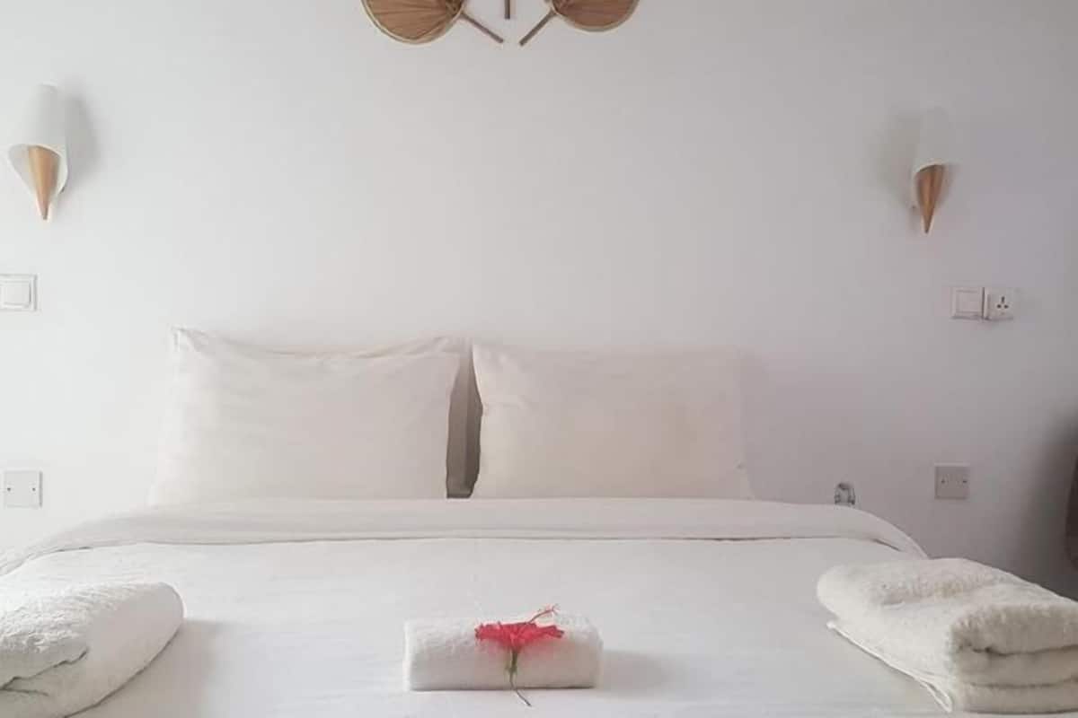 Down duvets, pillow-top beds, in-room safe, individually decorated