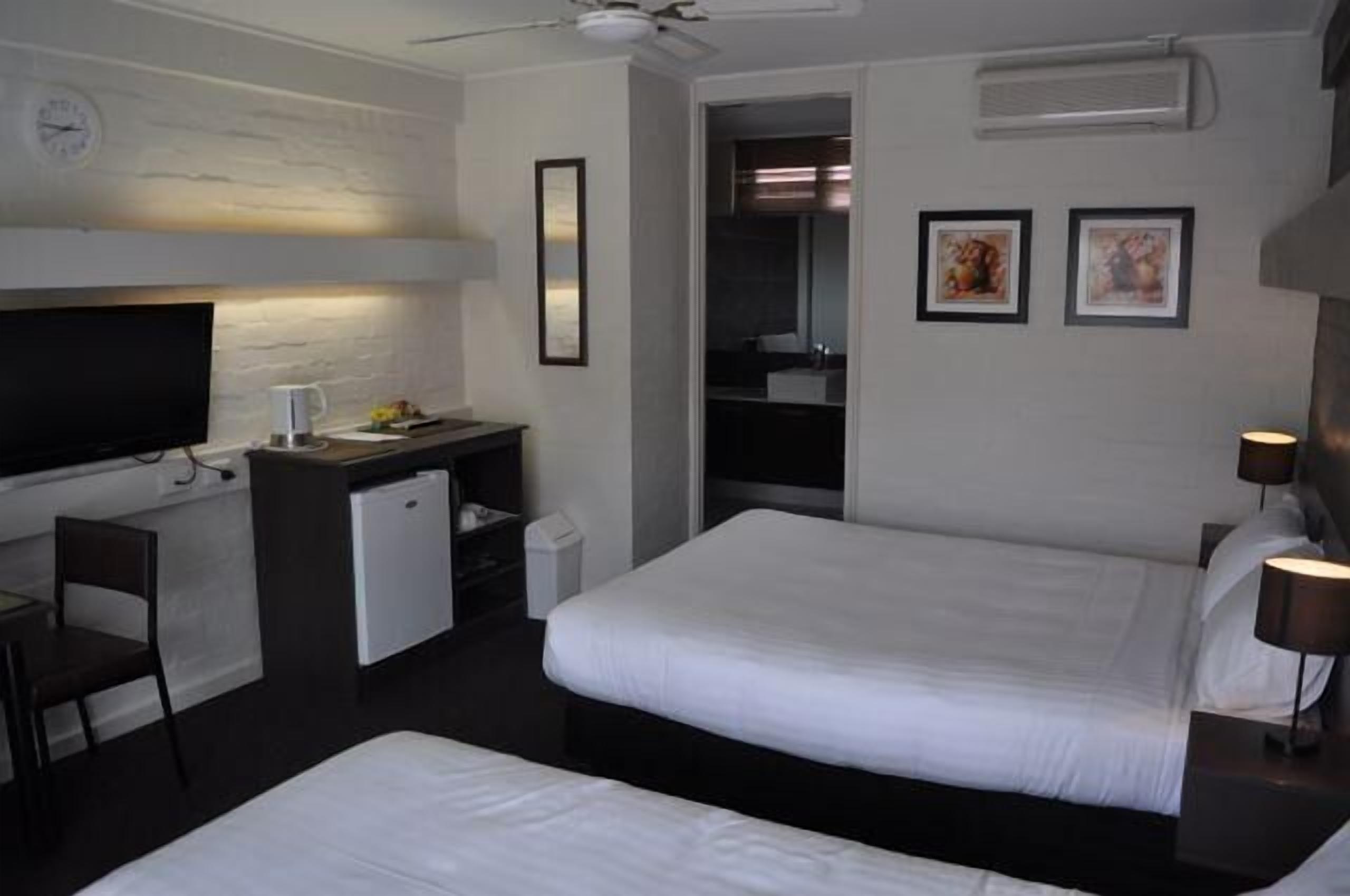 desk, blackout curtains, iron/ironing board, free wifi