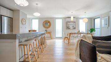 Penthouse | Living area | 40-inch Smart TV with digital channels