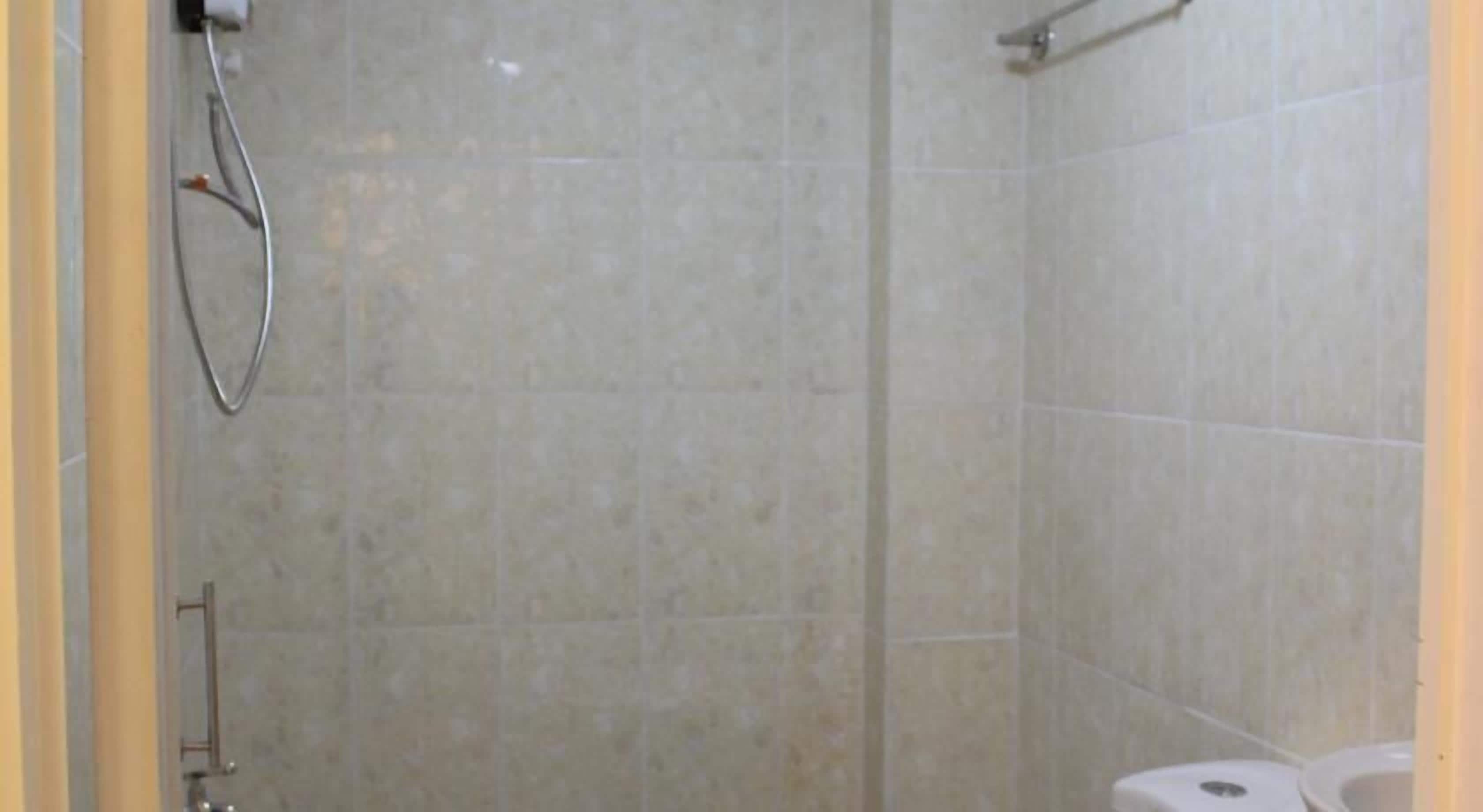 Shower, free toiletries, hair dryer, slippers
