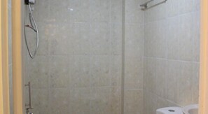 Shower, free toiletries, hair dryer, slippers