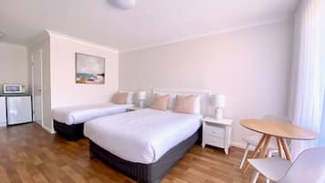 Twin Room | Blackout curtains, iron/ironing board, free WiFi, bed sheets