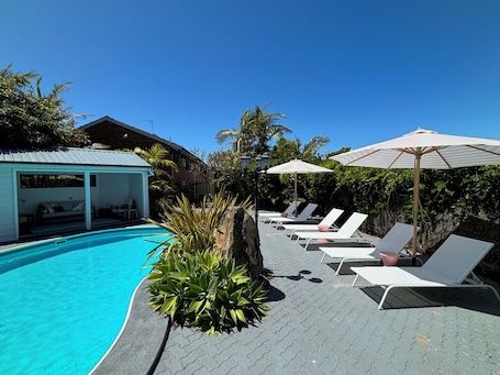 Seasonal outdoor pool, open 9:00 AM to 8:00 PM, free cabanas