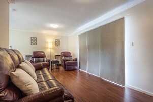 Three Bedroom Apartment (2 Queen, 2 Singles) | Living area | LCD TV