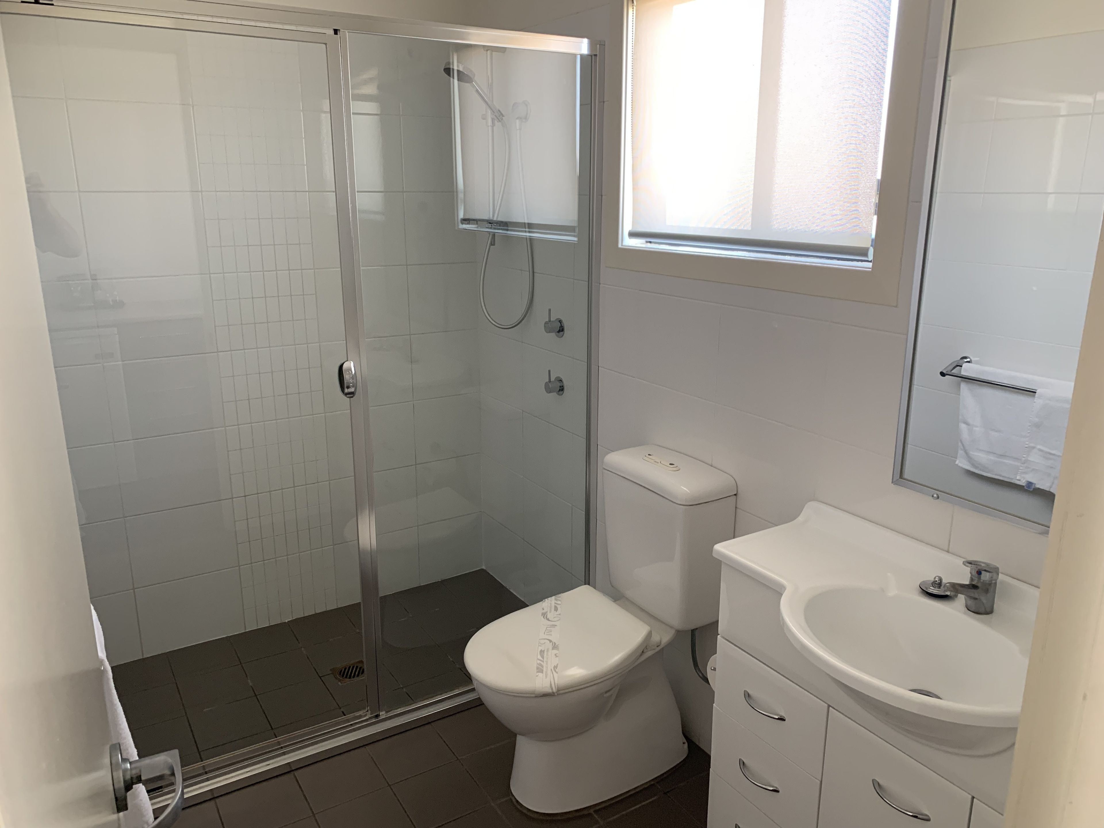 Bathroom | Shower, hair dryer, towels