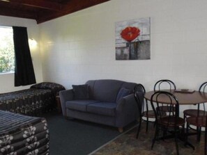 Departamento superior, 1 habitación | Sala de estar