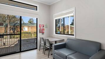 Deluxe Studio - Not Pet Friendly | Living area | Ping pong