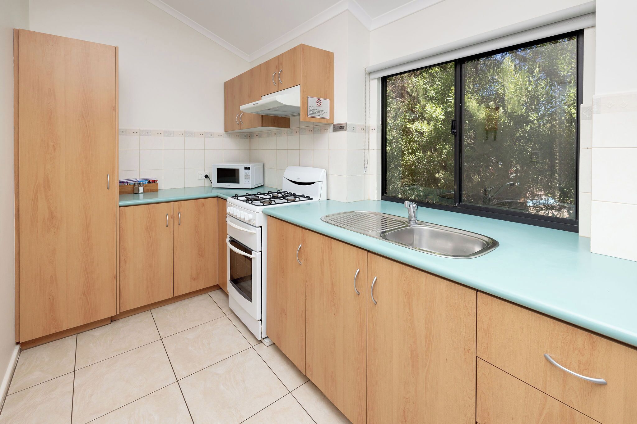 2 Bedroom Deluxe Chalet | Private kitchen | Fridge, microwave, stovetop, coffee/tea maker