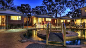 Seasonal outdoor pool, pool loungers