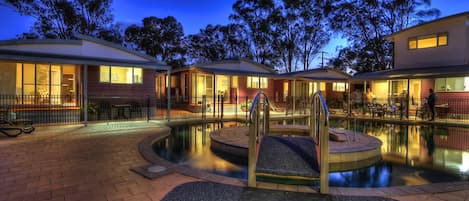 Seasonal outdoor pool, pool loungers