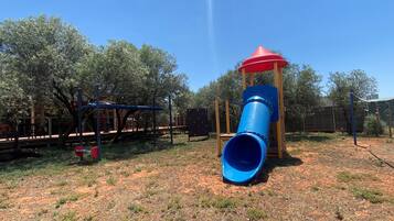 Kids can play on the slide and explore the play structure.