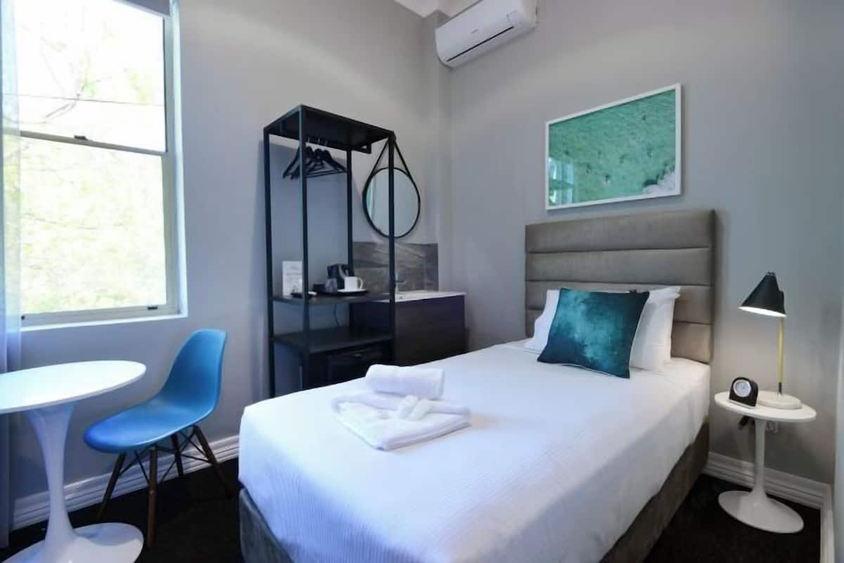 Desk, blackout curtains, free WiFi, bed sheets
