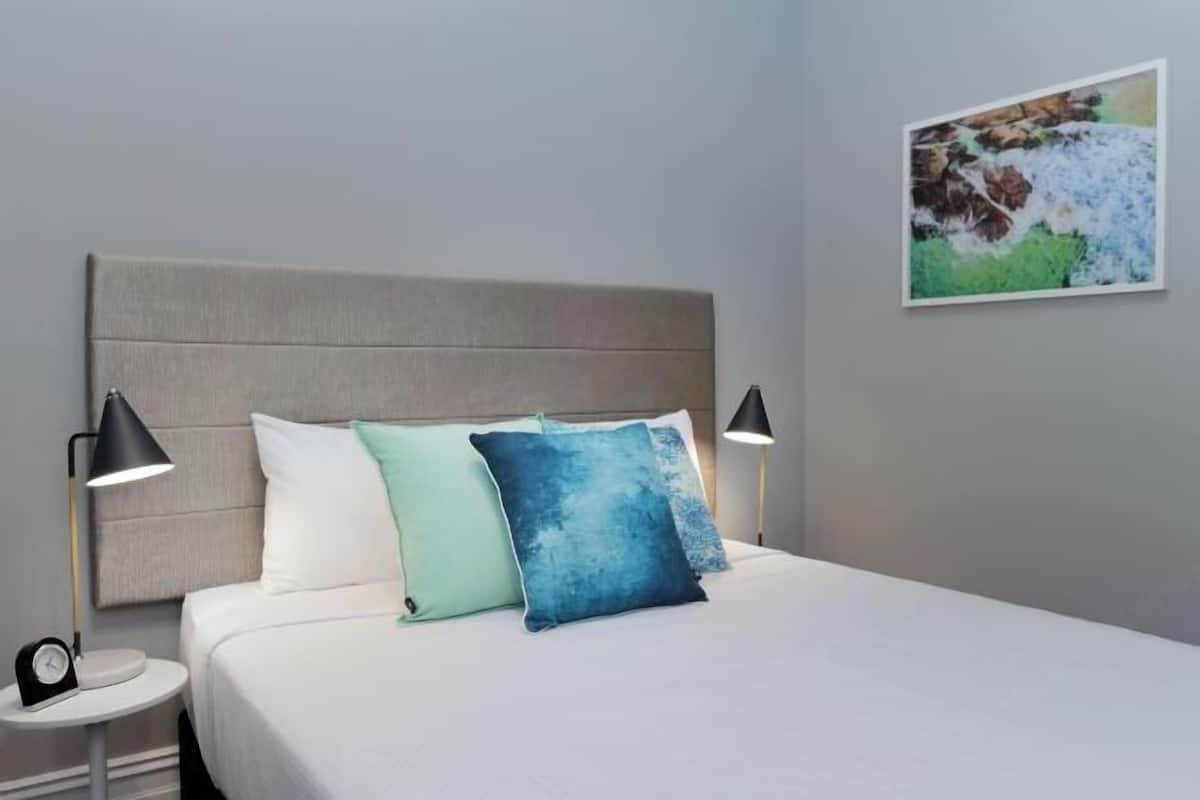Desk, blackout curtains, free WiFi, bed sheets