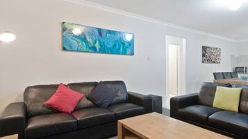 2 Bedroom Cottage | Living area | Flat-screen TV, DVD player