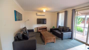 2 Bedroom Cottage | Living area | Flat-screen TV, DVD player