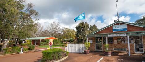A tourist park entrance with a sign for Margaret River.