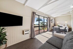 Tourist Flat | Living area | Flat-screen TV