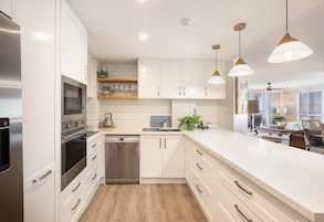 3 Bedroom Ocean View Executive Apartment | Private kitchen | Coffee/tea maker, full-size fridge, microwave, oven
