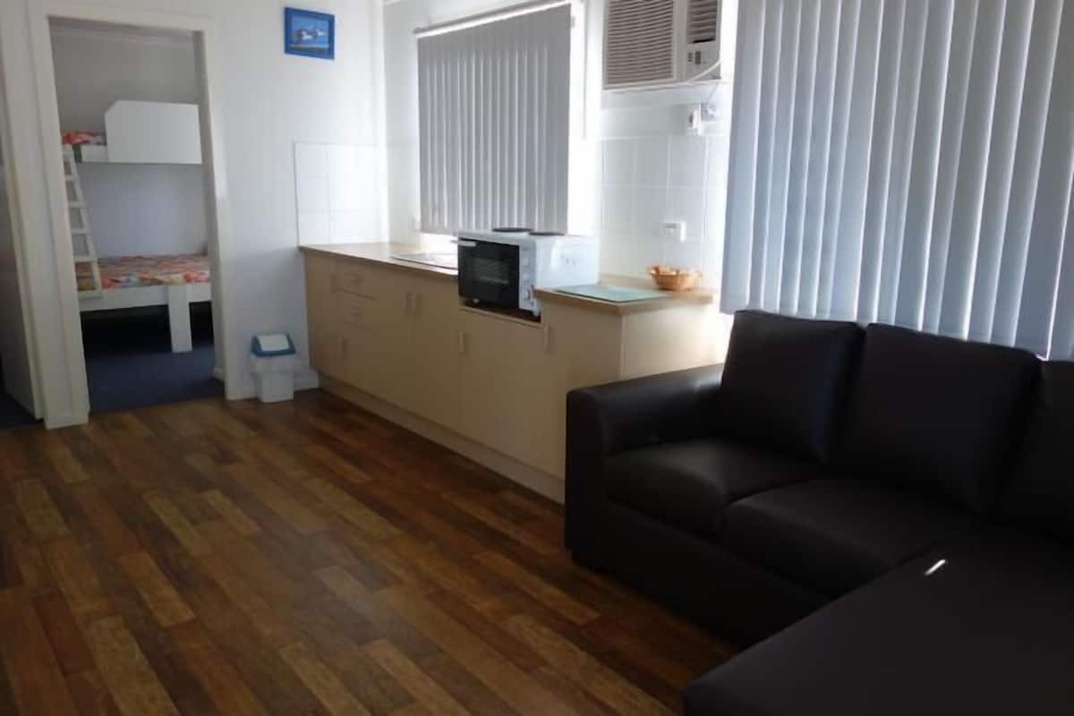 Standard Suite, 2 Bedrooms, Non Smoking, Kitchen (Beachside Villa 5-8) | Living area | LCD TV, DVD player
