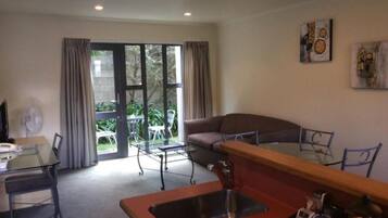 1 bedroom, desk, laptop workspace, iron/ironing board