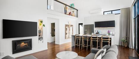 Deluxe V7 | Living area | 60-inch LED TV with digital channels, TV, Netflix