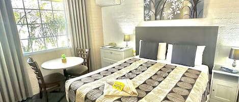 Standard Room, Non Smoking (Queen Standard Room) | Soundproofing, iron/ironing board, free WiFi, bed sheets