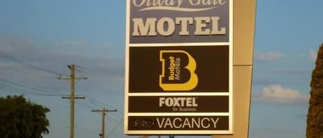 A motel sign with the name "Otway Gate Motel" and a "No Vacancy" sign below it.