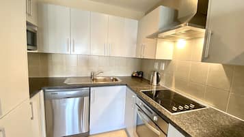 Family Penthouse, 3 Bedrooms | Private kitchen | Coffee/tea maker, electric kettle