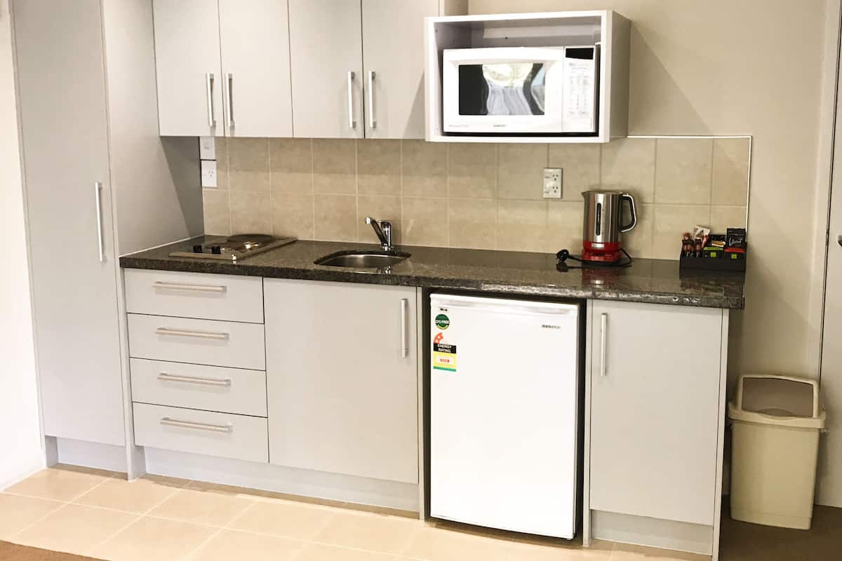 deluxe one bedroom apartment | private kitchenette | coffee/tea maker, electric kettle