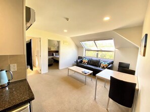 Familienapartment, 2 Schlafzimmer | Wohnbereich