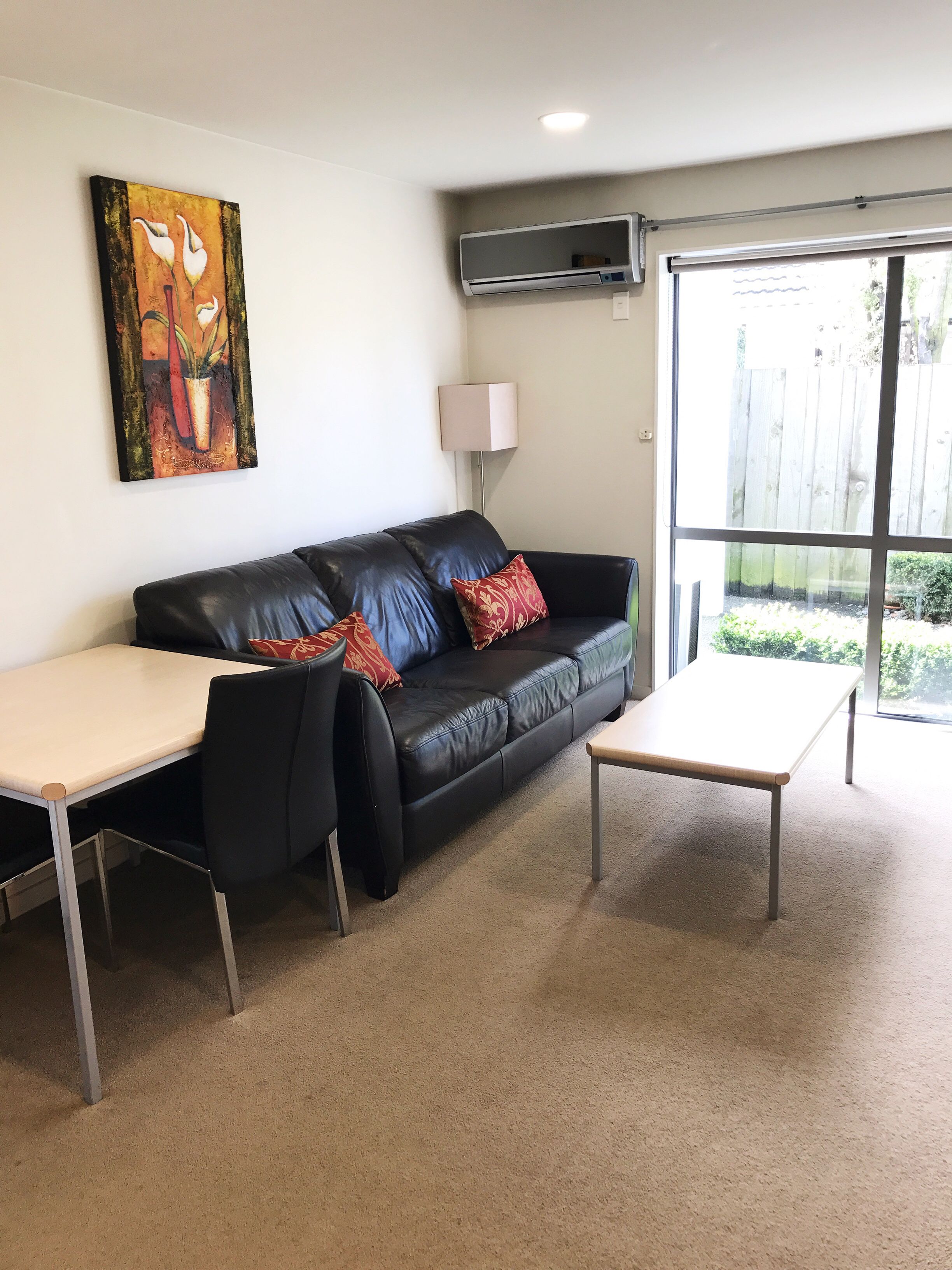 deluxe one bedroom apartment | living area | 42-inch tv with digital channels