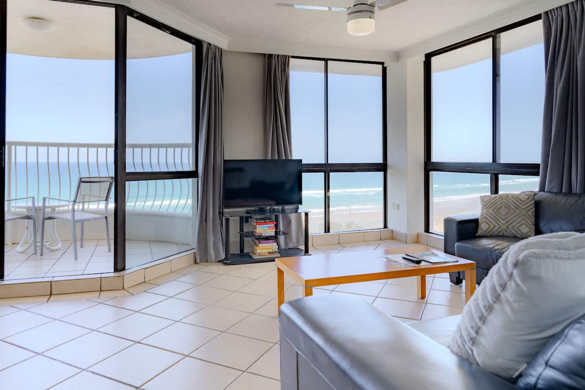 Two-Bedroom Apartment with Ocean View | Living area | 40-inch flat-screen TV with satellite channels, TV