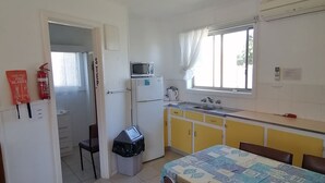 Basic Cabin, 2 Bedrooms (Unit 8) | Living area | TV, DVD player - Anchorage Holiday Units (Lakes Entrance)