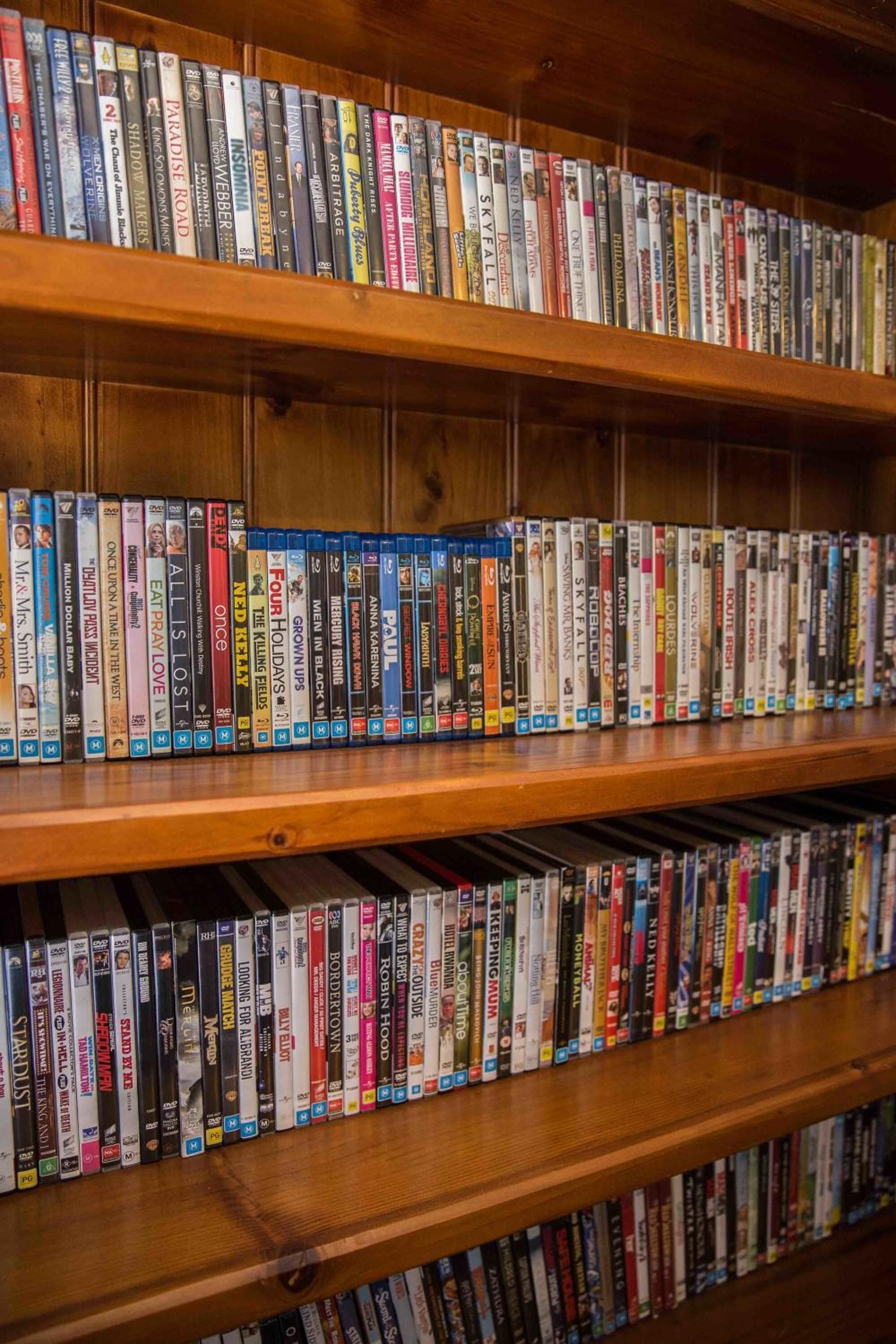 A bookshelf filled with various books.