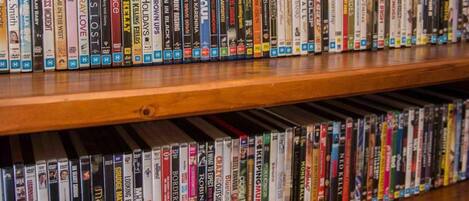 A bookshelf filled with various books.