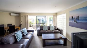 Family Apartment, 3 Bedrooms, Pool Access, Poolside | Living area | Flat-screen TV, DVD player