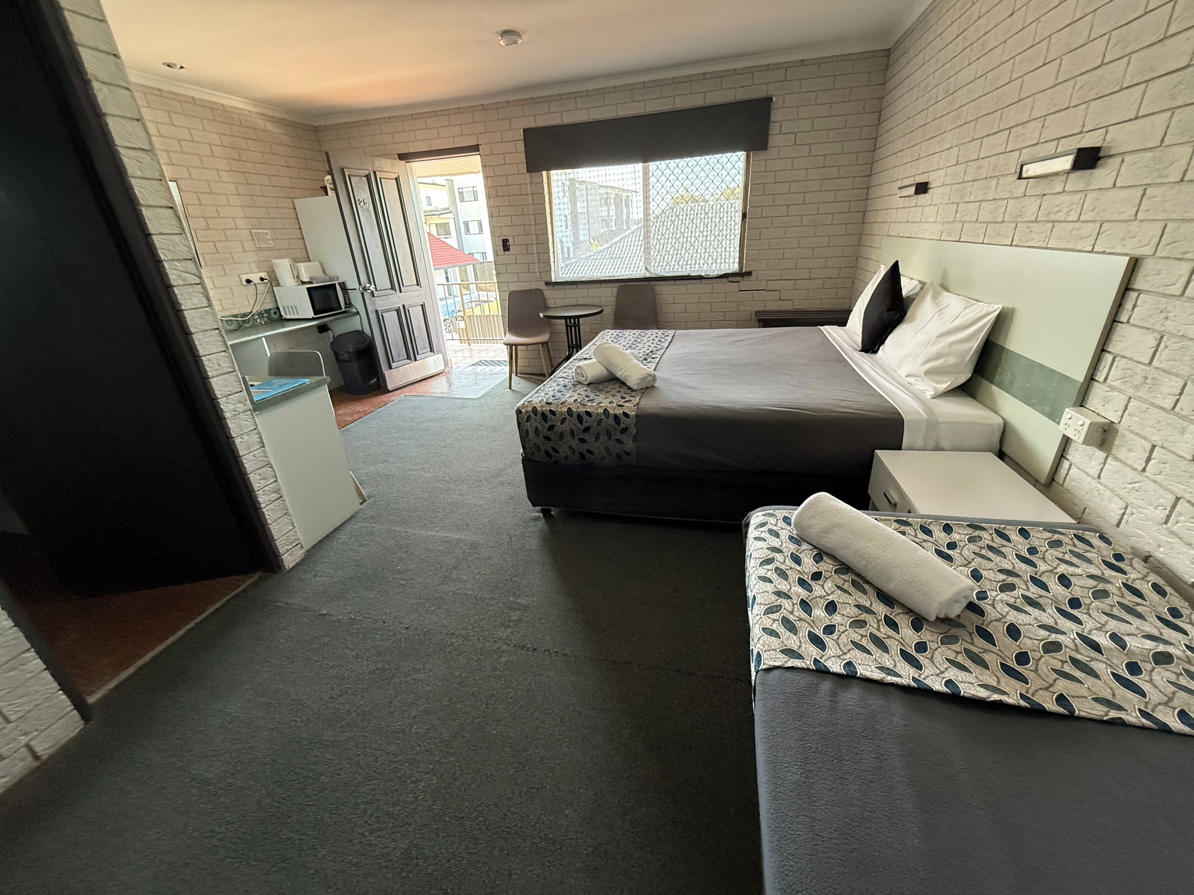 Standard Room | Blackout curtains, iron/ironing board, free WiFi