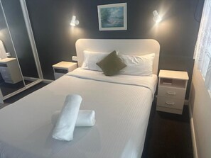Blackout drapes, soundproofing, iron/ironing board, free WiFi