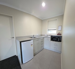 Apartment, 2 Bedrooms | Private kitchen | Fridge, microwave, coffee/tea maker, electric kettle - Tower Junction Motor Lodge (Christchurch)