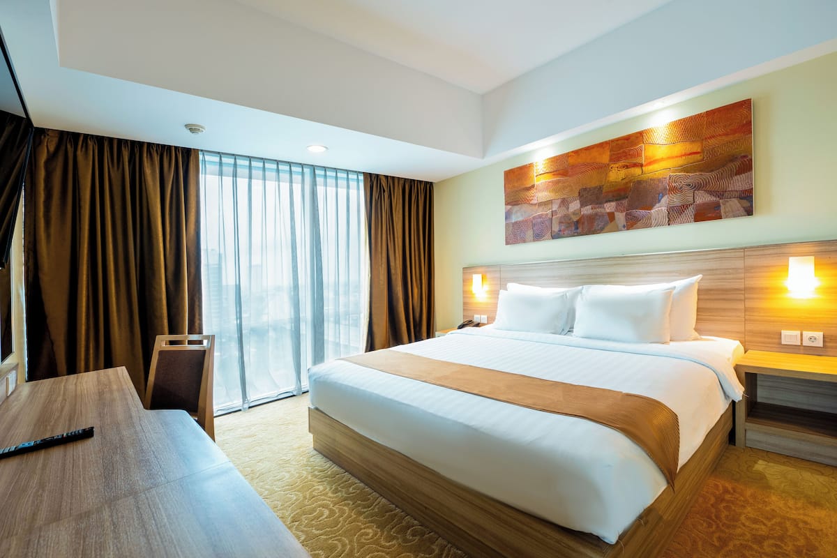 Executive Suite Room | 1 sovrum, minibar, värdeförvaringsskåp på rummet och skrivbord