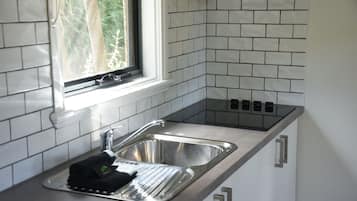 Superior Family Cottage | Private kitchenette | Fridge, microwave, stovetop, coffee/tea maker