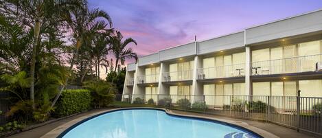 Outdoor pool, open 8:00 AM to 7:00 PM, pool loungers