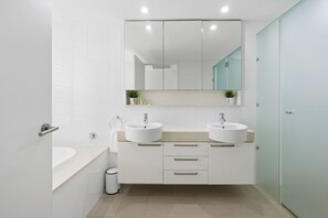 Separate bathtub and shower, free toiletries, hair dryer, towels