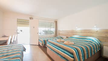 Standard Suite, 1 Bedroom, Non Smoking (Quad Room) | Desk, soundproofing, iron/ironing board, free cots/infant beds