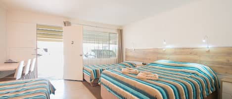 Standard Suite, 1 Bedroom, Non Smoking (Quad Room) | Desk, soundproofing, iron/ironing board, free cribs/infant beds